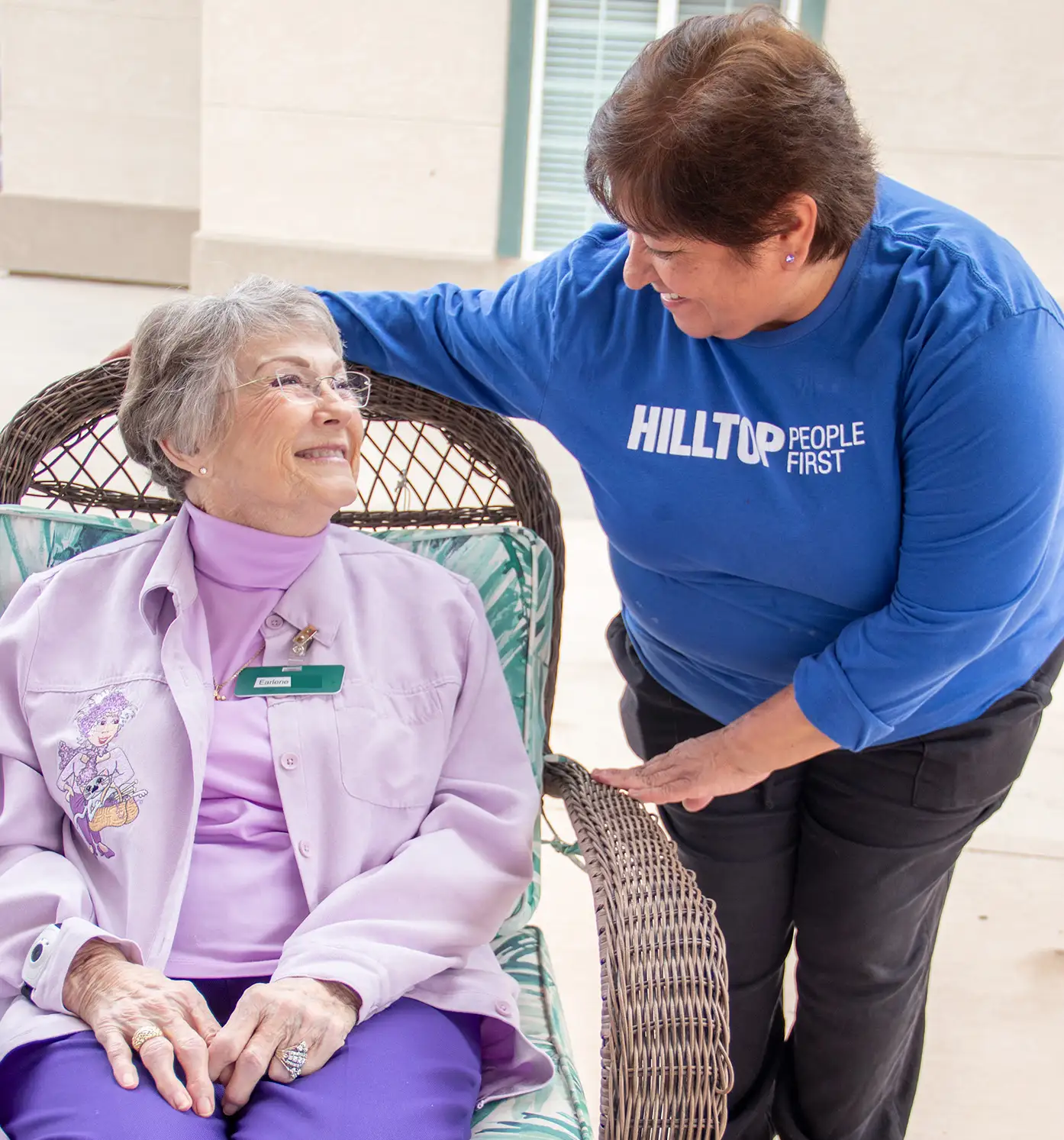 Hilltop staff with an older woman