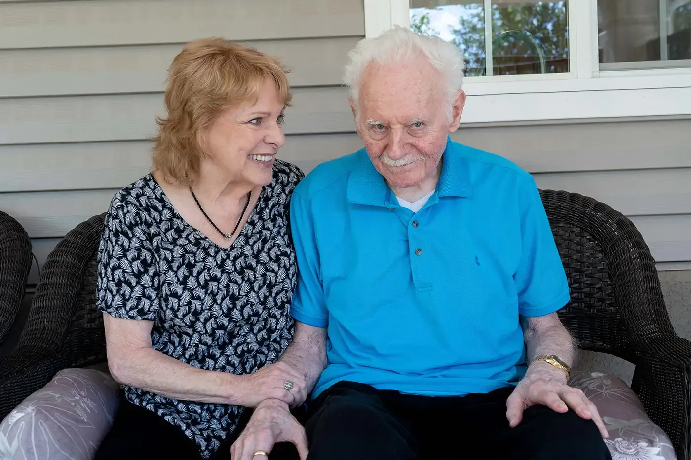Staff member with an elderly participant.