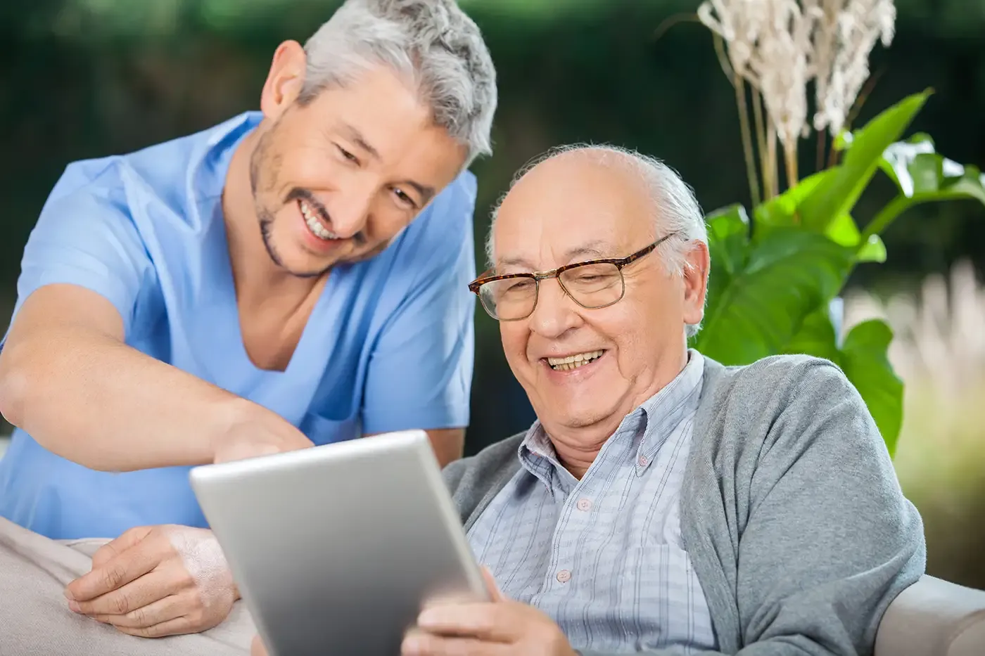 Staff member with an elderly patient