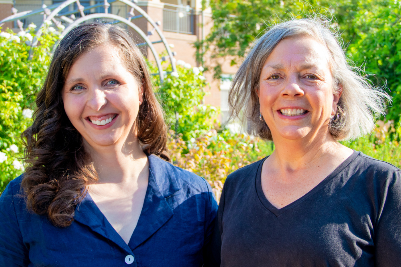 Two women smiling